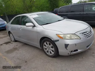 2009 Toyota Camry LE with VIN 4T1BK46K29U592439, listed as a IAAI auction lot 42128676 with 182,898 mi miles. Bid and sale history available at carsss.com. Image 1.