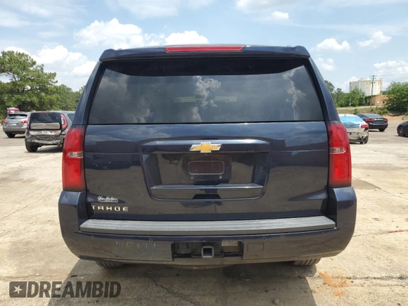 2020 Chevrolet Tahoe LT with VIN 1GNSKBKC7LR162186, listed as a Copart auction lot 56729325 with 114,210 mi miles and Salvage title. Bid and sale history available at DreamBid. Image 6.