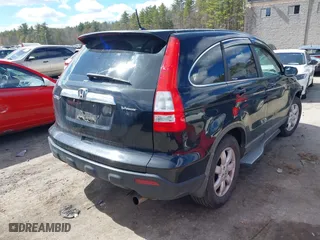 2009 Honda CR-V EX with VIN 5J6RE48529L032633, listed as a IAAI auction lot 41881486 with 163,857 mi miles. Bid and sale history available at carsss.com. Image 4.