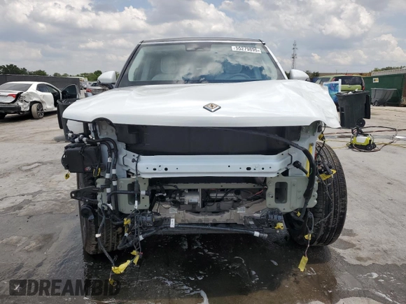 2025 Rivian R1S Adventure z VIN 7PDSGBBA5SN067374, wystawiony jako Copart lot #55279895 z przebiegiem 1 120 mil mil oraz Szkoda całkowita • Salvage title. Historia ofert i sprzedaży dostępna na DreamBid. Obrazek 5.