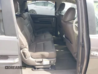2014 Honda Odyssey EX-L with VIN 5FNRL5H67EB106183, listed as a IAAI auction lot 42210600 with 196,166 mi miles and . Bid and sale history available at DreamBid. Image 8.