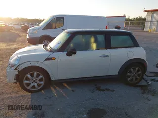 2011 MINI Hardtop with VIN WMWSU3C58BT097825, listed as a IAAI auction lot 42040442 with 141,978 mi miles and . Bid and sale history available at DreamBid. Image 14.