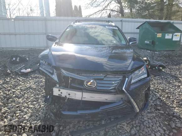 2019 Lexus RX with VIN JTJDZKCA9K2016466, listed as a Copart auction lot 86510614 with 52,064 mi miles and Salvage Title. Bid and sale history available at carsss.com. Image 5.