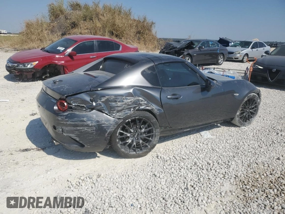 2023 Mazda MX-5 Miata Grand Touring z VIN JM1NDAM70P0550719, wystawiony jako Copart lot #75485484 z przebiegiem 21 110 mil mil oraz Szkoda całkowita • Salvage title. Historia ofert i sprzedaży dostępna na DreamBid. Obrazek 3.
