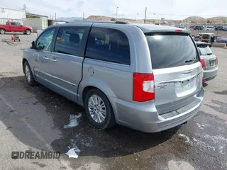 2013 Chrysler Town & Country Limited with VIN 2C4RC1GGXDR548106, listed as a IAAI auction lot 41890220 with 189,908 mi miles. Bid and sale history available at carsss.com. Image 3.