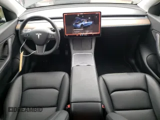 2022 Tesla Model Y Long Range z VIN 7SAYGDEEXNA008898, wystawiony jako Copart lot #54915445 z przebiegiem 35 467 mil mil oraz Szkoda całkowita • Salvage title. Historia ofert i sprzedaży dostępna na DreamBid. Obrazek 8.