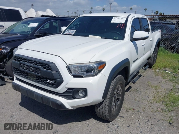 2021 Toyota Tacoma 4WD SR5 with VIN 3TMDZ5BN7MM103321, listed as a IAAI auction lot 41765512 with 49,009 mi miles. Bid and sale history available at carsss.com. Image 2.