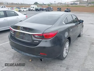 2017 Mazda Mazda6 Touring with VIN JM1GL1V51H1137065, listed as a IAAI auction lot 42078517 with 81,457 mi miles. Bid and sale history available at carsss.com. Image 4.