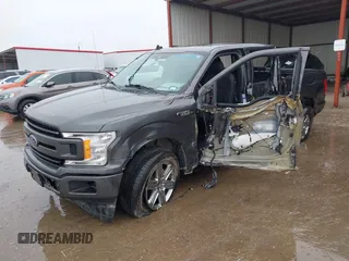 2019 Ford F-150 XL with VIN 1FTEW1C56KKC31025, listed as a IAAI auction lot 41452618 with 153,422 mi miles and . Bid and sale history available at DreamBid. Image 17.
