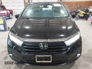 2021 Honda Odyssey Touring z VIN 5FNRL6H83MB028264, wystawiony jako IAAI lot #42206204 z przebiegiem 45 332 mil mil oraz . Historia ofert i sprzedaży dostępna na DreamBid. Obrazek 12.