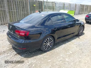 2016 Volkswagen Jetta Sport z VIN 3VWD17AJ2GM232702, wystawiony jako IAAI lot #42399962 z przebiegiem 175 038 mil mil oraz . Historia ofert i sprzedaży dostępna na DreamBid. Obrazek 4.