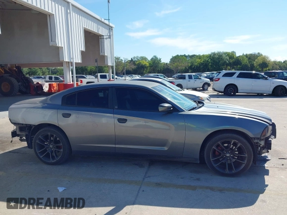 2012 Dodge Charger SE with VIN 2C3CDXBG3CH117581, listed as a IAAI auction lot 41897204 with 176,108 mi miles and . Bid and sale history available at DreamBid. Image 14.