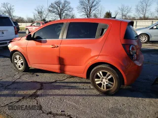 2013 Chevrolet Sonic LT with VIN 1G1JC6SB2D4228540, listed as a Copart auction lot 85100394 with 95,613 mi miles and Salvage Title. Bid and sale history available at carsss.com. Image 2.