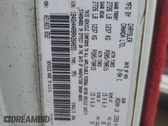 1994 Dodge Caravan Grand SE z VIN 1B4GH44R8RX260655, wystawiony jako Copart lot #52807845 z przebiegiem 149 054 mil mil oraz Nie do naprawy • Non repairable. Historia ofert i sprzedaży dostępna na DreamBid. Obrazek 13.