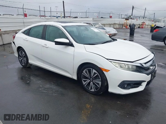 2016 Honda Civic Sedan EX-L with VIN 2HGFC1F78GH648639, listed as a IAAI auction lot 41895039 with 121,072 mi miles. Bid and sale history available at carsss.com. Image 1.