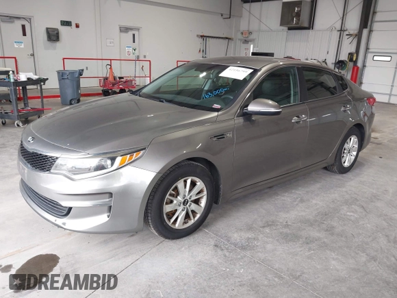 2016 Kia Optima LX with VIN 5XXGT4L33GG026183, listed as a IAAI auction lot 42156799 with 163,000 mi miles and . Bid and sale history available at carsss.com. Image 2.