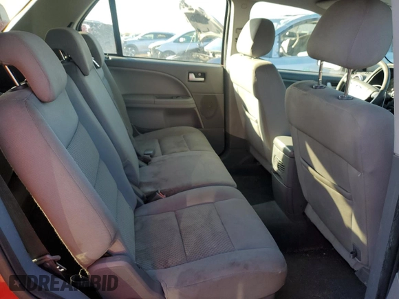 2007 Ford Freestyle SEL with VIN 1FMDK05177GA12219, listed as a Copart auction lot 79571274 with 136,348 mi miles and Salvage title. Bid and sale history available at DreamBid. Image 10.