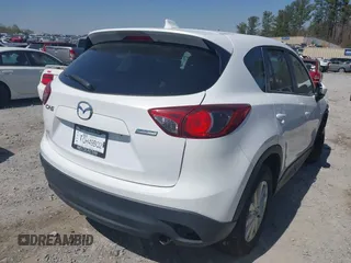 2013 Mazda CX-5 Touring with VIN JM3KE2CE0D0119032, listed as a IAAI auction lot 41891556 with 174,745 mi miles and . Bid and sale history available at carsss.com. Image 4.