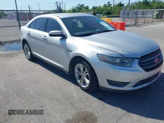 2013 Ford Taurus SEL with VIN 1FAHP2E81DG129229, listed as a IAAI auction lot 41999326 with 205,856 mi miles. Bid and sale history available at carsss.com. Image 1.