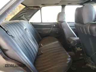 1985 Mercedes-Benz 190 z VIN WDBDB22C8FF039826, wystawiony jako Copart lot #47875265 z przebiegiem 159 296 mil mil oraz Szkody całkowita. Historia ofert i sprzedaży dostępna na DreamBid. Obrazek 10.