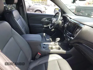 2023 Chevrolet Traverse LT z VIN 1GNEVHKWXPJ264538, wystawiony jako IAAI lot #42252033 z przebiegiem 25 321 mil mil oraz . Historia ofert i sprzedaży dostępna na DreamBid. Obrazek 5.