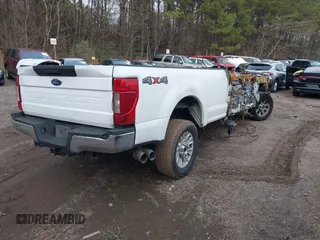 2021 Ford Super Duty F-250 SRW XL with VIN 1FT7W2BT9MED93098, listed as a IAAI auction lot 41006834 with 1 mi miles. Bid and sale history available at carsss.com. Image 4.