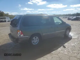 2002 Ford Windstar SEL with VIN 2FMDA53432BB05185, listed as a Copart auction lot 80389234 with 166,397 mi miles and Salvage title. Bid and sale history available at DreamBid. Image 3.