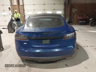 2014 Tesla Model S 60 with VIN 5YJSA1H1XEFP30497, listed as a IAAI auction lot 41294630 with 203,663 mi miles and . Bid and sale history available at DreamBid. Image 16.