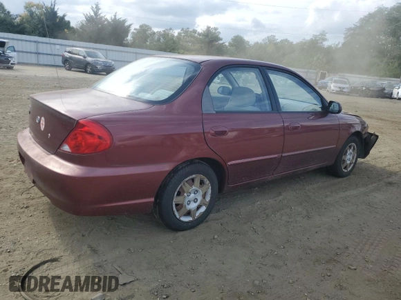 2003 Kia Spectra with VIN KNAFB121935241589, listed as a Copart auction lot 71933194 with 61,738 mi miles and Salvage Title. Bid and sale history available at DreamBid. Image 3.