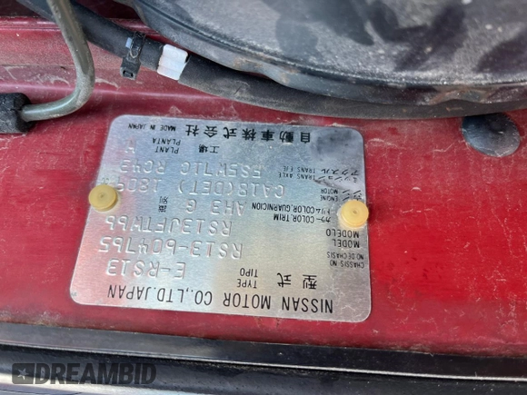 1989 Nissan 240SX z VIN RS13604765, wystawiony jako Copart lot #46514985 z przebiegiem 115 929 mil mil oraz Szkoda całkowita • Salvage title. Historia ofert i sprzedaży dostępna na DreamBid. Obrazek 12.