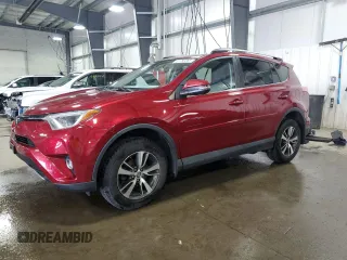 2018 Toyota RAV4 XLE with VIN 2T3RFREVXJW841710, listed as a Copart auction lot 61783265 with 159,410 mi miles and Salvage title. Bid and sale history available at DreamBid. Image 1.