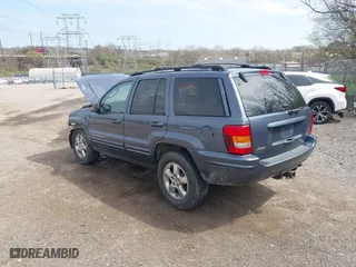 2004 Jeep Grand Cherokee Limited with VIN 1J8GW58N44C274714, listed as a IAAI auction lot 41922819 with 204,251 mi miles. Bid and sale history available at carsss.com. Image 3.