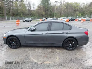2013 BMW 3 Series 328i xDrive with VIN WBA3B3C56DF542509, listed as a IAAI auction lot 42010587 with 187,082 mi miles. Bid and sale history available at carsss.com. Image 14.