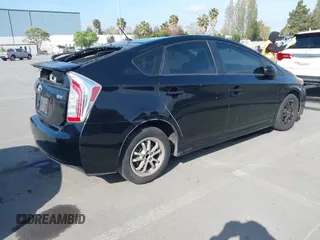 2015 Toyota Prius Four with VIN JTDKN3DU0F1986030, listed as a IAAI auction lot 42034054 with 194,915 mi miles. Bid and sale history available at carsss.com. Image 4.