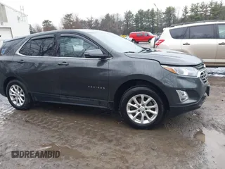 2019 Chevrolet Equinox LT with VIN 2GNAXUEV4K6106092, listed as a IAAI auction lot 42010880 with 66,011 mi miles and . Bid and sale history available at DreamBid. Image 13.