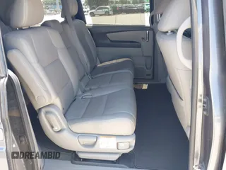 2014 Honda Odyssey EX-L z VIN 5FNRL5H69EB095297, wystawiony jako IAAI lot #42299438 z przebiegiem 126 841 mil mil oraz . Historia ofert i sprzedaży dostępna na DreamBid. Obrazek 8.