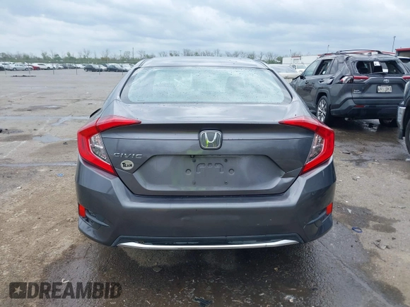 2019 Honda Civic LX with VIN 19XFC2F68KE007409, listed as a IAAI auction lot 41887406 with 57,147 mi miles and . Bid and sale history available at DreamBid. Image 16.