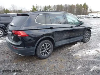 2019 Volkswagen Tiguan SE with VIN 3VV3B7AX2KM196407, listed as a IAAI auction lot 40993730 with 86,904 mi miles. Bid and sale history available at carsss.com. Image 4.