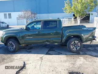 2021 Toyota Tacoma SR with VIN 3TMCZ5AN7MM395940, listed as a IAAI auction lot 41240832 with 39,338 mi miles and . Bid and sale history available at DreamBid. Image 14.