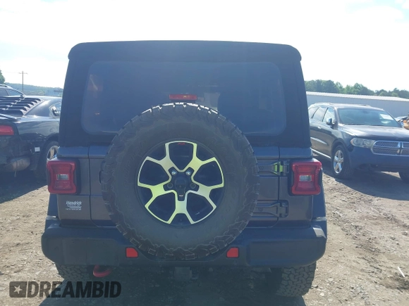 2021 Jeep Wrangler Unlimited Rubicon with VIN 1C4HJXFN5MW509483, listed as a IAAI auction lot 42245703 with 59,461 mi miles and . Bid and sale history available at DreamBid. Image 16.