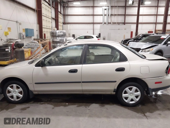 1998 Mazda Protege DX z VIN JM1BC1419W0171802, wystawiony jako IAAI lot #42202861 z przebiegiem 252 304 mil mil oraz . Historia ofert i sprzedaży dostępna na DreamBid. Obrazek 14.