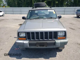 2000 Jeep Cherokee with VIN 1J4FN28S6YL210944, listed as a Copart auction lot 65163475 with 147,609 mi miles and Salvage title. Bid and sale history available at DreamBid. Image 5.