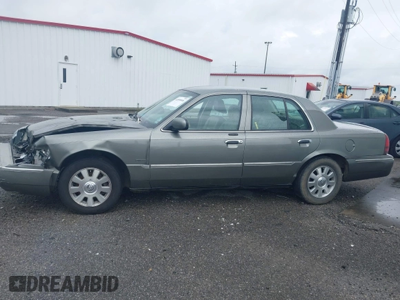 2004 Mercury Grand Marquis LS Premium z VIN 2MEHM75W64X654827, wystawiony jako IAAI lot #41890046 z przebiegiem Nie podano mil oraz . Historia ofert i sprzedaży dostępna na DreamBid. Obrazek 14.