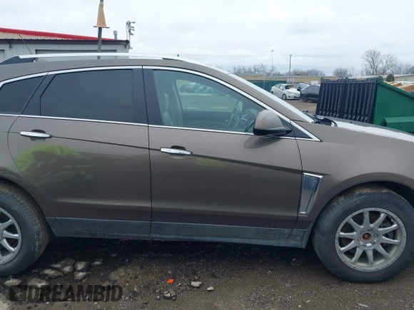 2015 Cadillac SRX Luxury Collection with VIN 3GYFNBE34FS521518, listed as a IAAI auction lot 41893073 with 82,700 mi miles and . Bid and sale history available at carsss.com. Image 13.