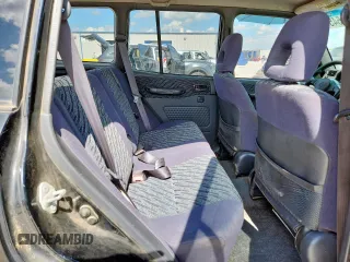 2000 Toyota RAV4 with VIN JT3GP10V8Y7073667, listed as a Copart auction lot 62571545 with 371,362 mi miles and Salvage title. Bid and sale history available at DreamBid. Image 11.