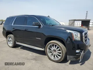 2016 GMC Yukon SLT with VIN 1GKS1BKCXGR122111, listed as a Copart auction lot 69900124 with 73,781 mi miles and Salvage Title. Bid and sale history available at carsss.com. Image 4.