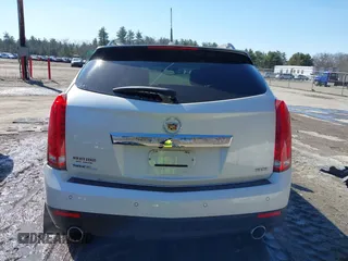 2014 Cadillac SRX Performance Collection with VIN 3GYFNFE30ES586713, listed as a IAAI auction lot 41791356 with 74,927 mi miles and . Bid and sale history available at DreamBid. Image 17.