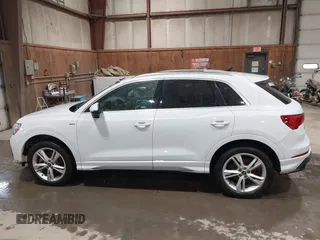 2021 Audi Q3 S line Premium Plus with VIN WA1EECF31M1060356, listed as a IAAI auction lot 42242850 with 83,380 mi miles and . Bid and sale history available at DreamBid. Image 14.