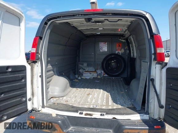 2012 GMC Savana Cargo with VIN 1GTW7FCA8C1200300, listed as a IAAI auction lot 42016518 with 259,841 mi miles. Bid and sale history available at carsss.com. Image 8.