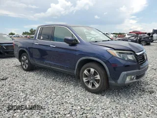 2019 Honda Ridgeline RTL-E with VIN 5FPYK3F76KB010613, listed as a Copart auction lot 60401125 with 90,492 mi miles and Salvage title. Bid and sale history available at DreamBid. Image 4.